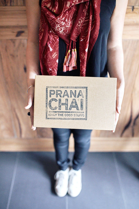 Holding Prana Chai Strater Kit